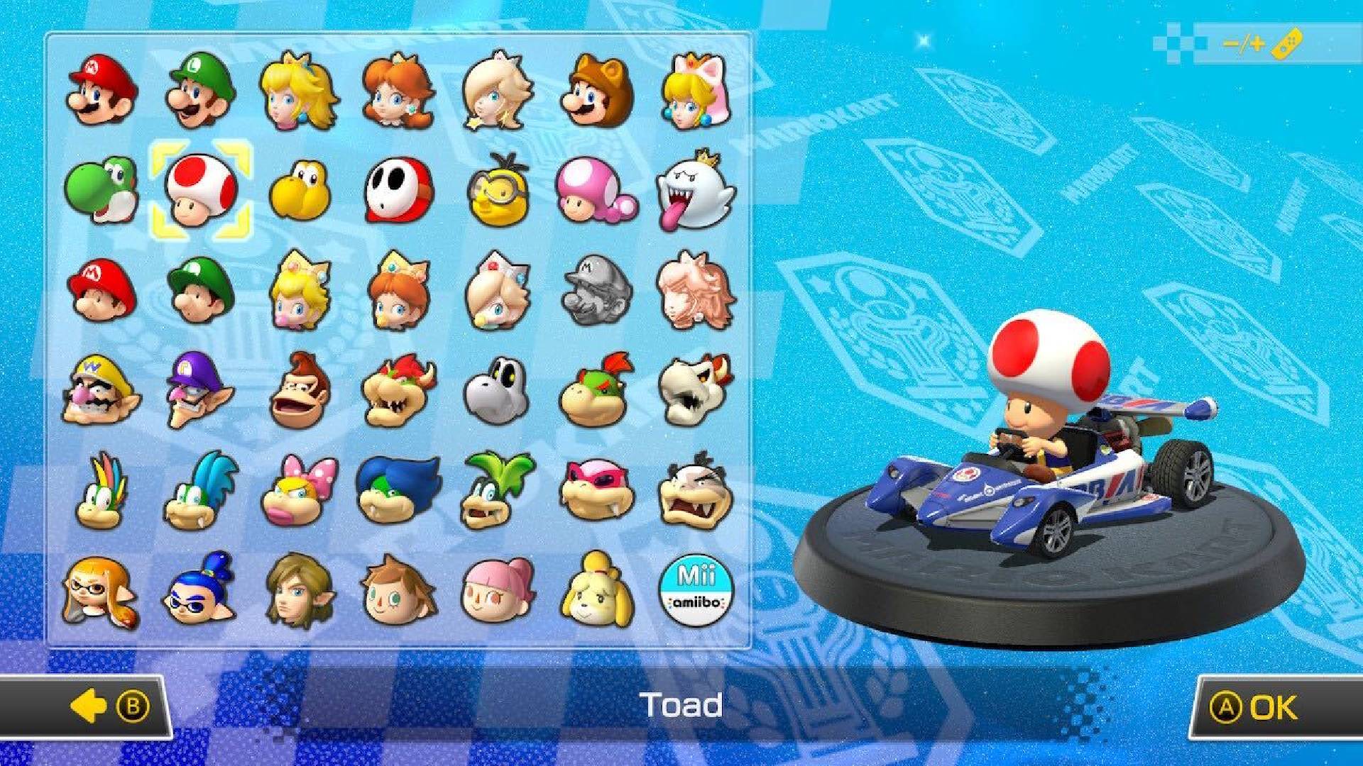 Toad is visible on a character selection screen, sitting in a kart