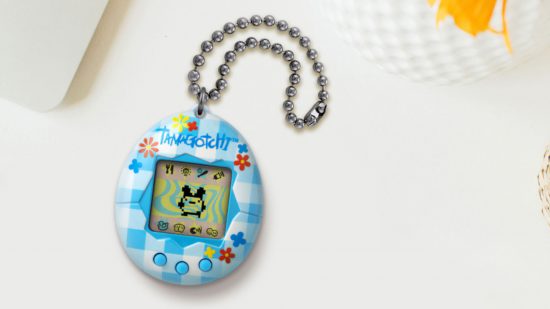 Promo art of blue gingham Tamagotchi