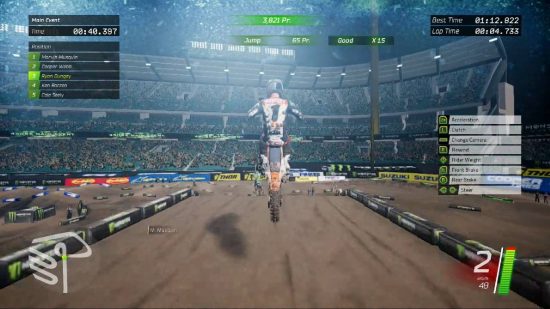 Motorbike games: a motocross bike jumps over a dirt mound