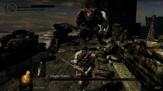 Dark Souls bosses: the Taurus Demon chasing the chosen undead on a bridge