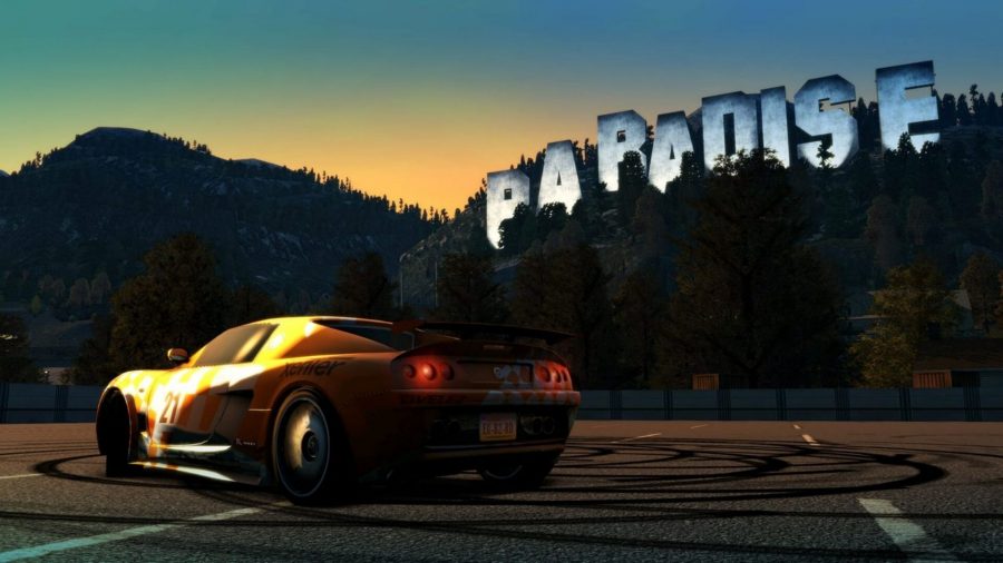 A yellow car parked in front of a sign that says "paradise" on a hill, akin to the Hollywood sign, in one of the many car games Burnout Paradise Remastered.